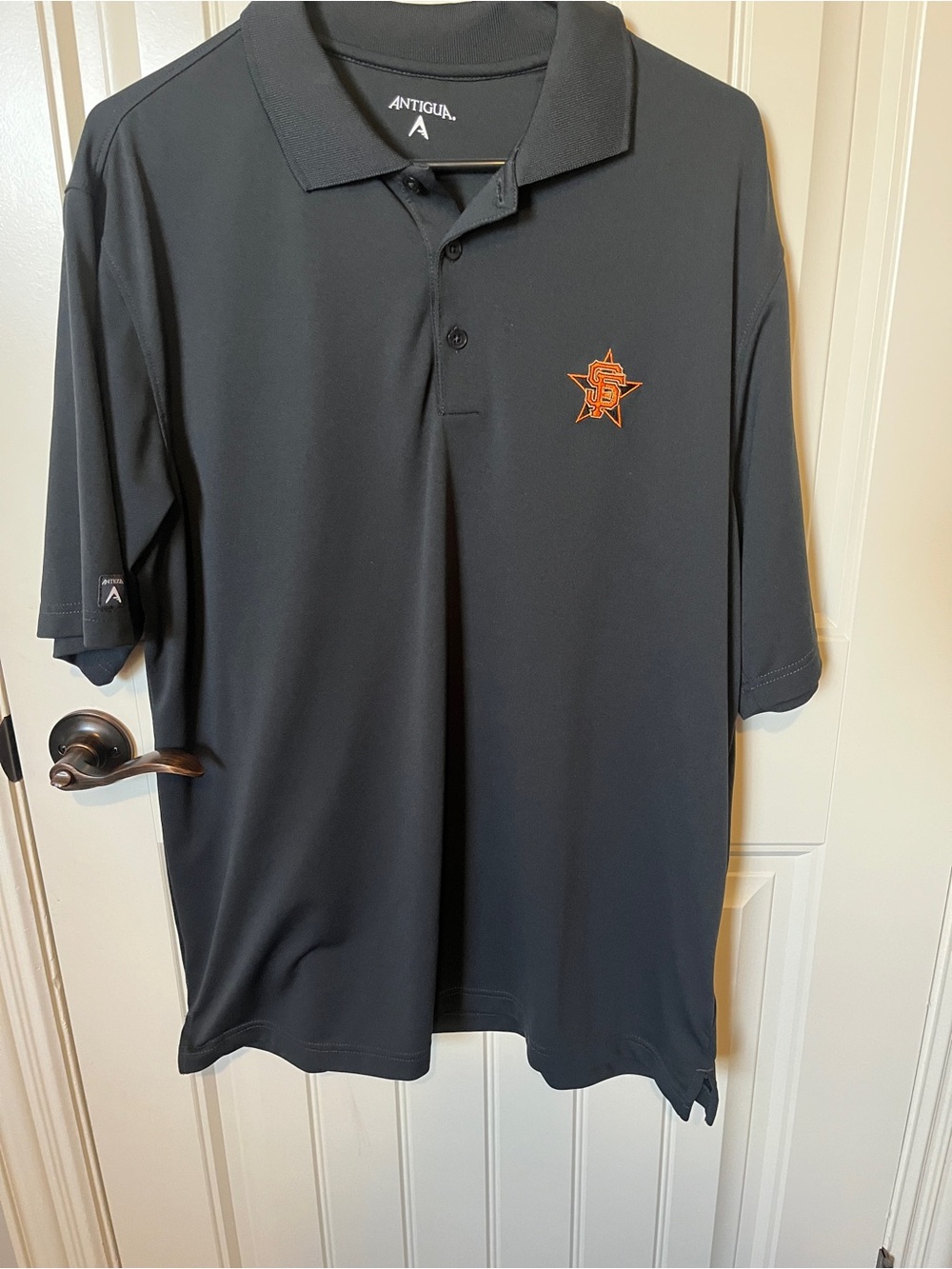 Antigua Men’s Black Polo with San Francisco Giants Oranges Star Emblem